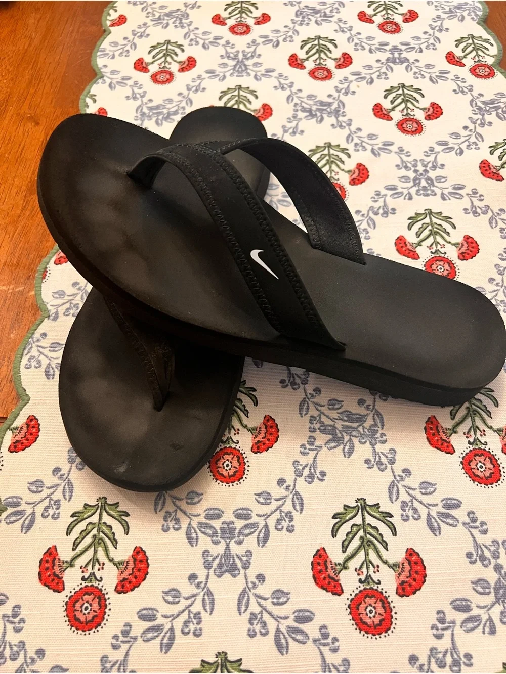 Woman’s Nike Black Flip Flop Sandals with White Swoosh